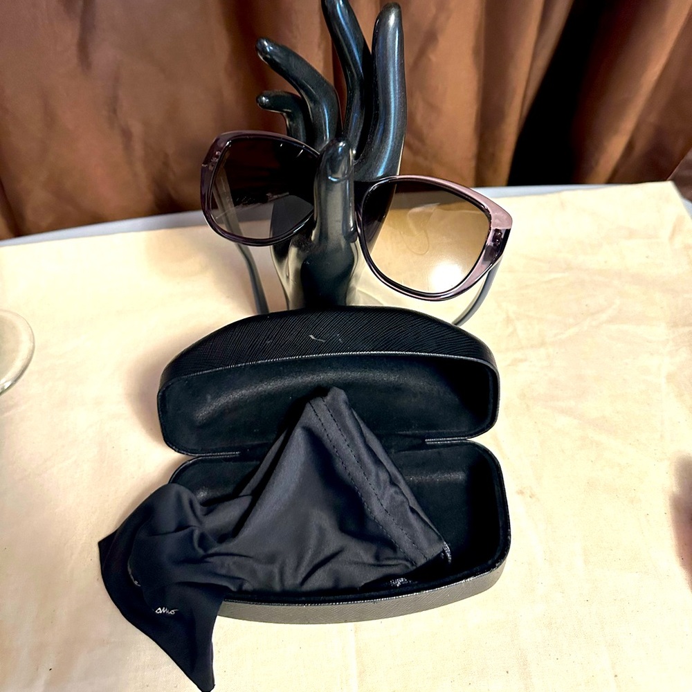 Salvatore Ferragamo sunglasses with pouch and case. In excellent condition.
